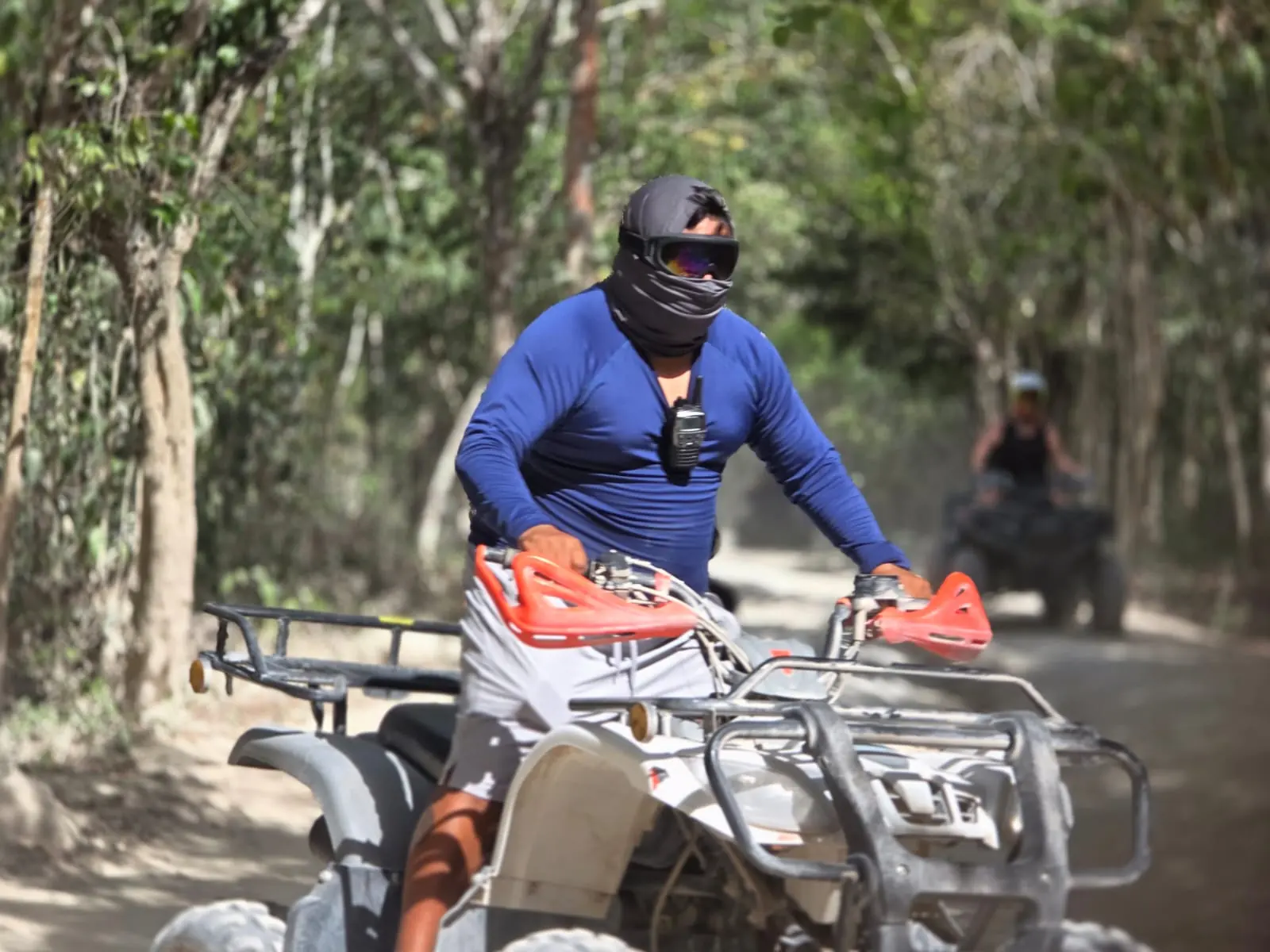 Real ATV rider on a jungle trail during a Cozumel excursion